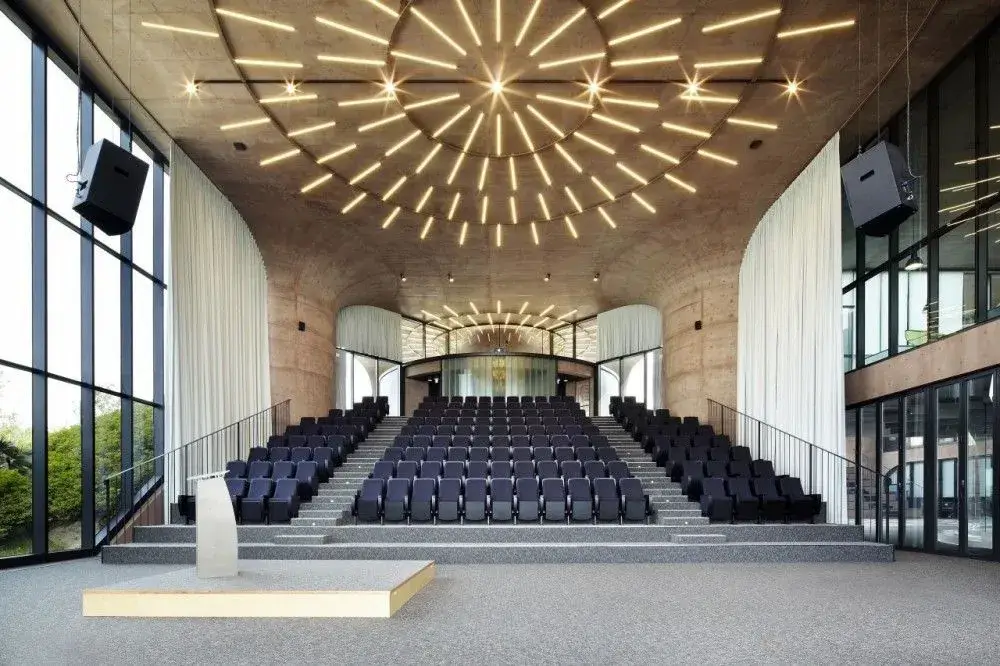 Modern and spacious conference hall with large windows